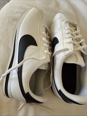 Nike big kids Cortez sneakers White with Black Swoosh